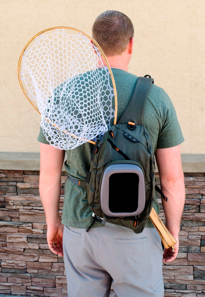 Fly fishing sling pack with outlet net